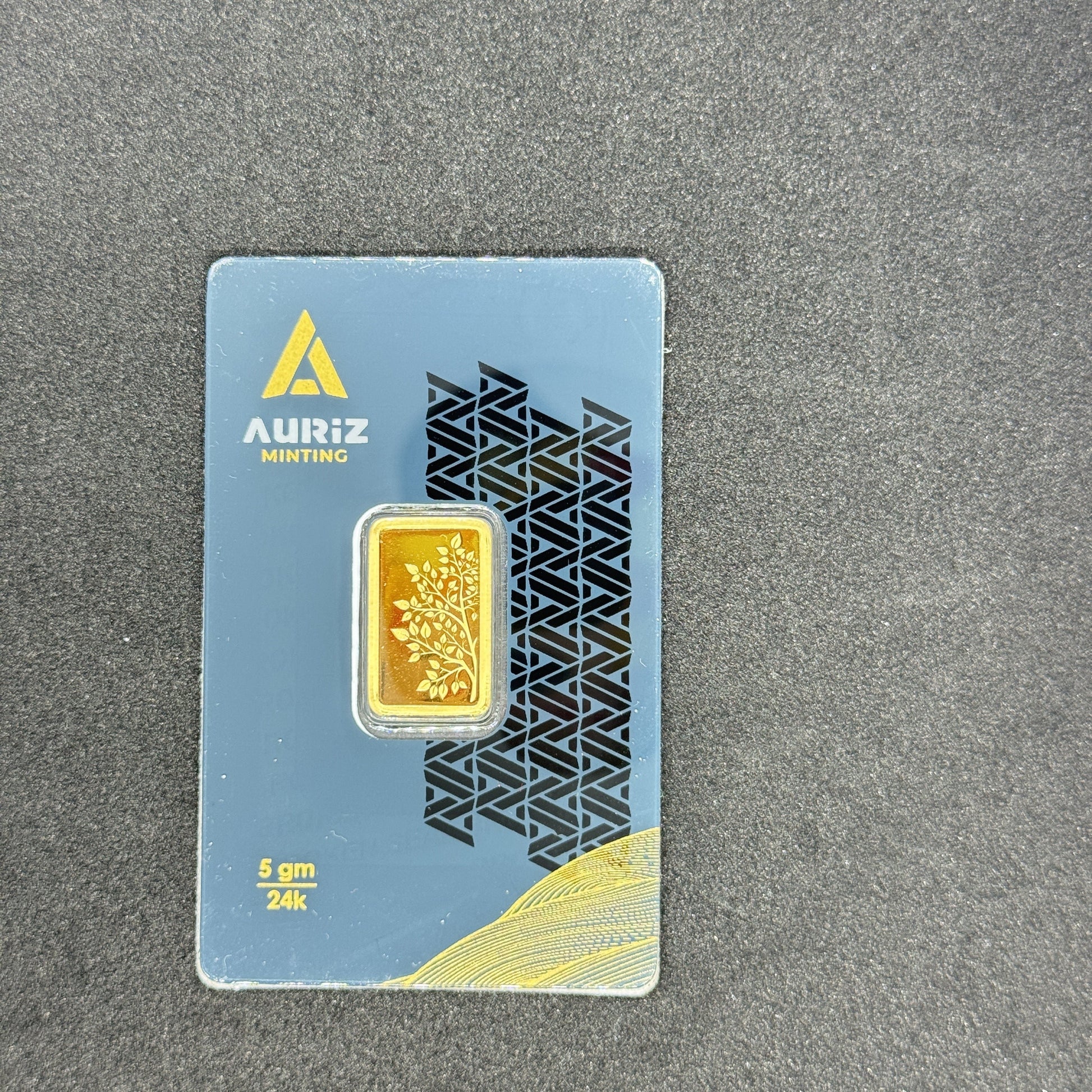 Gold bar on a blue card with 'Aurez' branding on a gray background