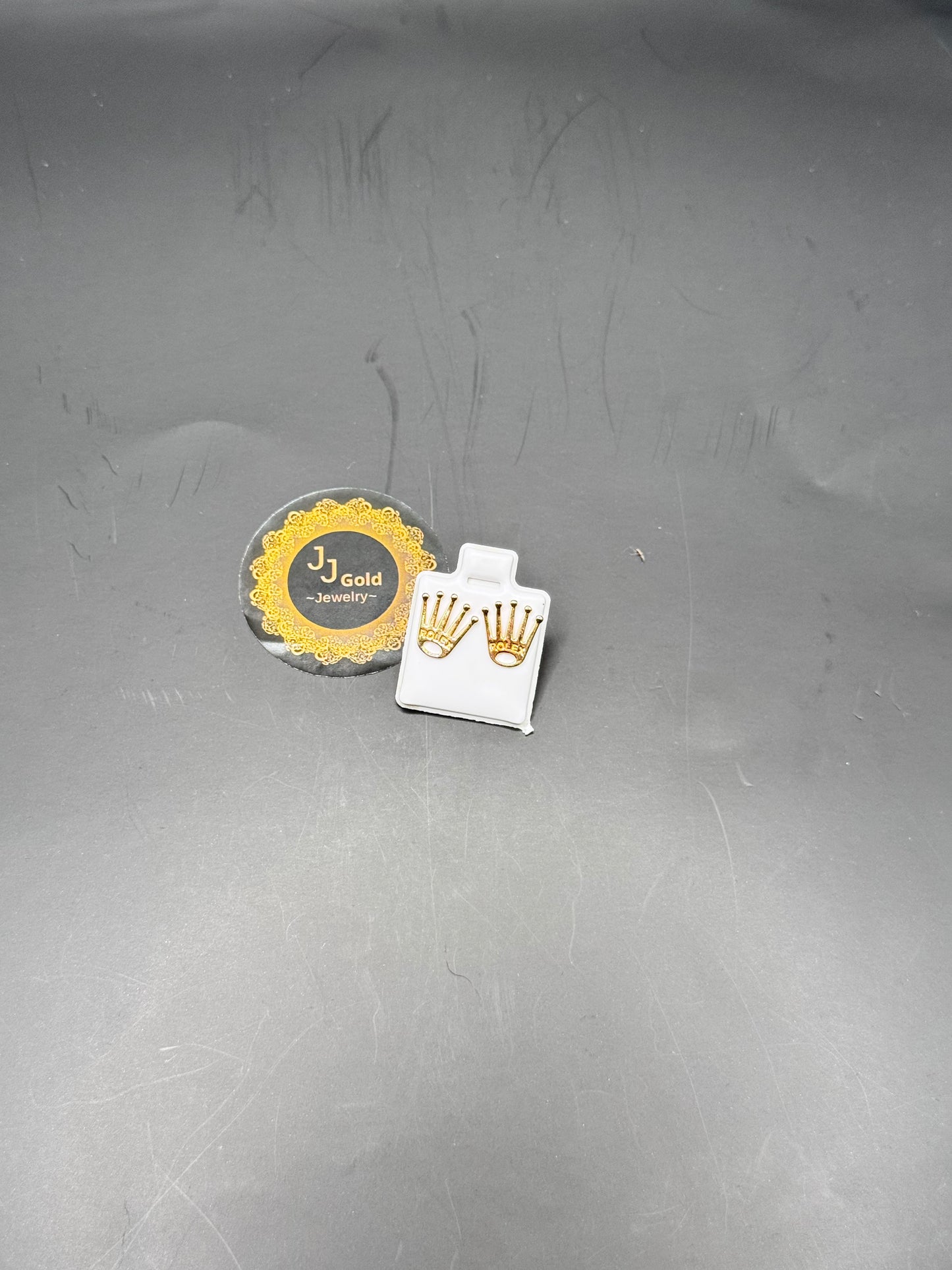 18karat Rolex stud earrings
