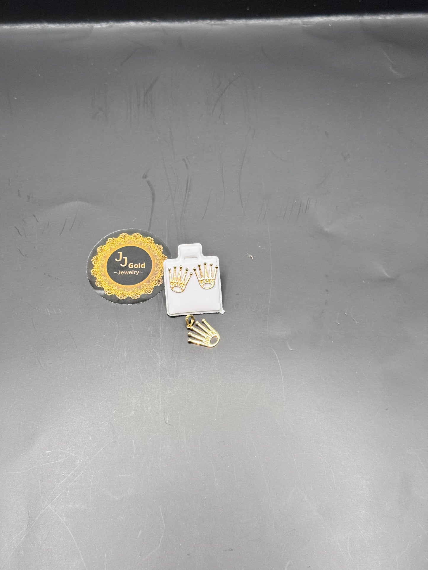 18karat Rolex set earrings and Pendant